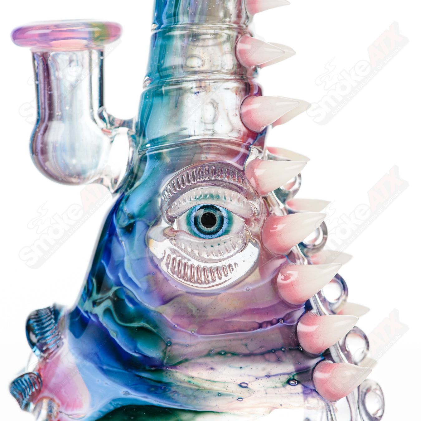 UV tie-dye glass soul flask by Nobody x SALT, a colorful concentrate rig with vibrant tie-dye design and glass construction.