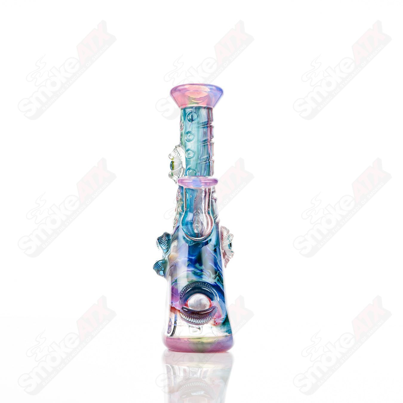 UV tie-dye Soul Flask glass by Nobody x SALT, a colorful concentrate rig with vibrant tie-dye design and clear glass accents.