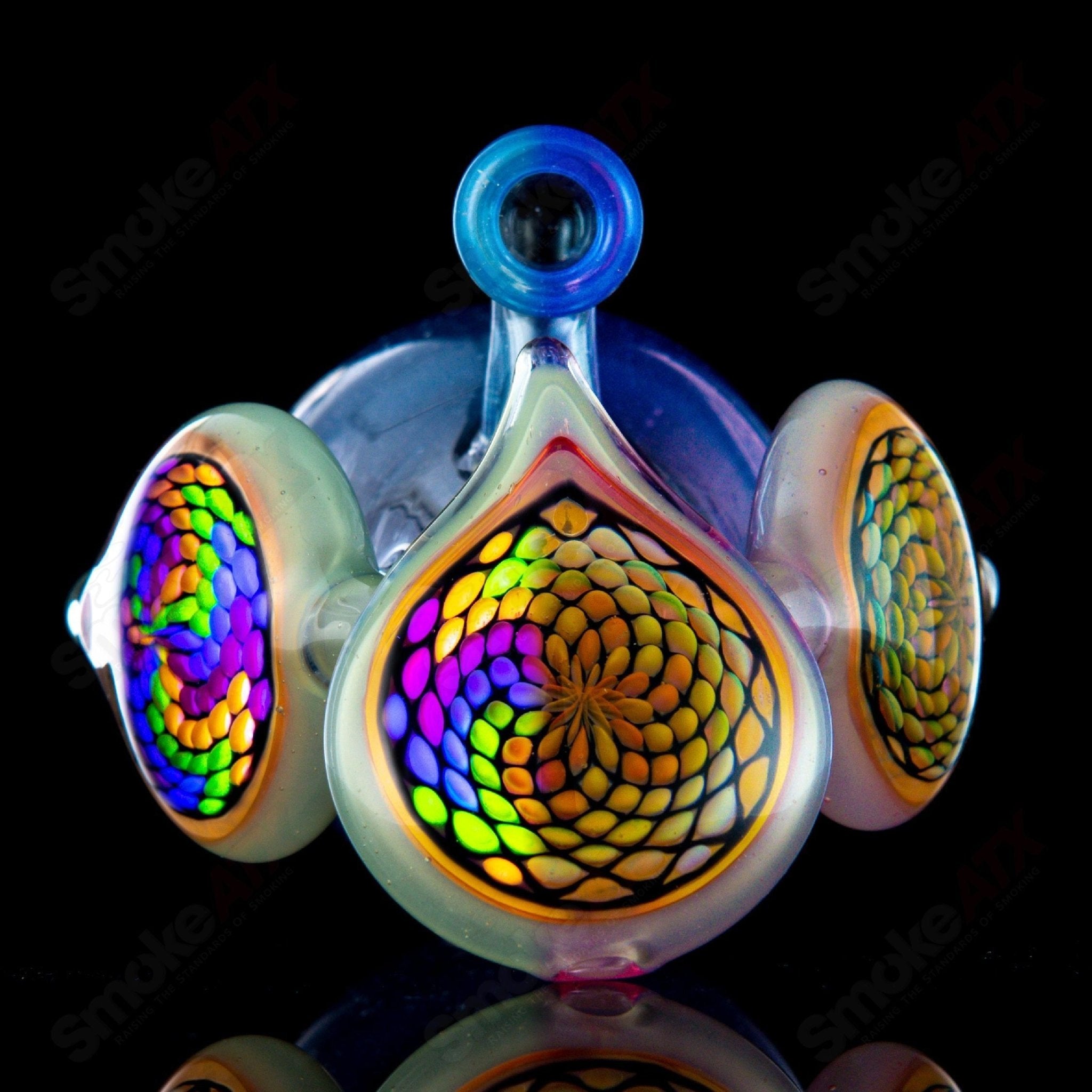 BCM Glass UV+CFL dual uptake recycler heady glass with intricate glasswork and vibrant colors, showcasing its unique recycler design