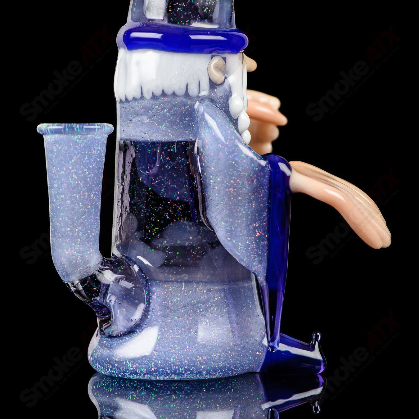 Heady glass Wizard Rig Stargazer by Phil Siegel, a concentrate rig with intricate glasswork and a celestial design.