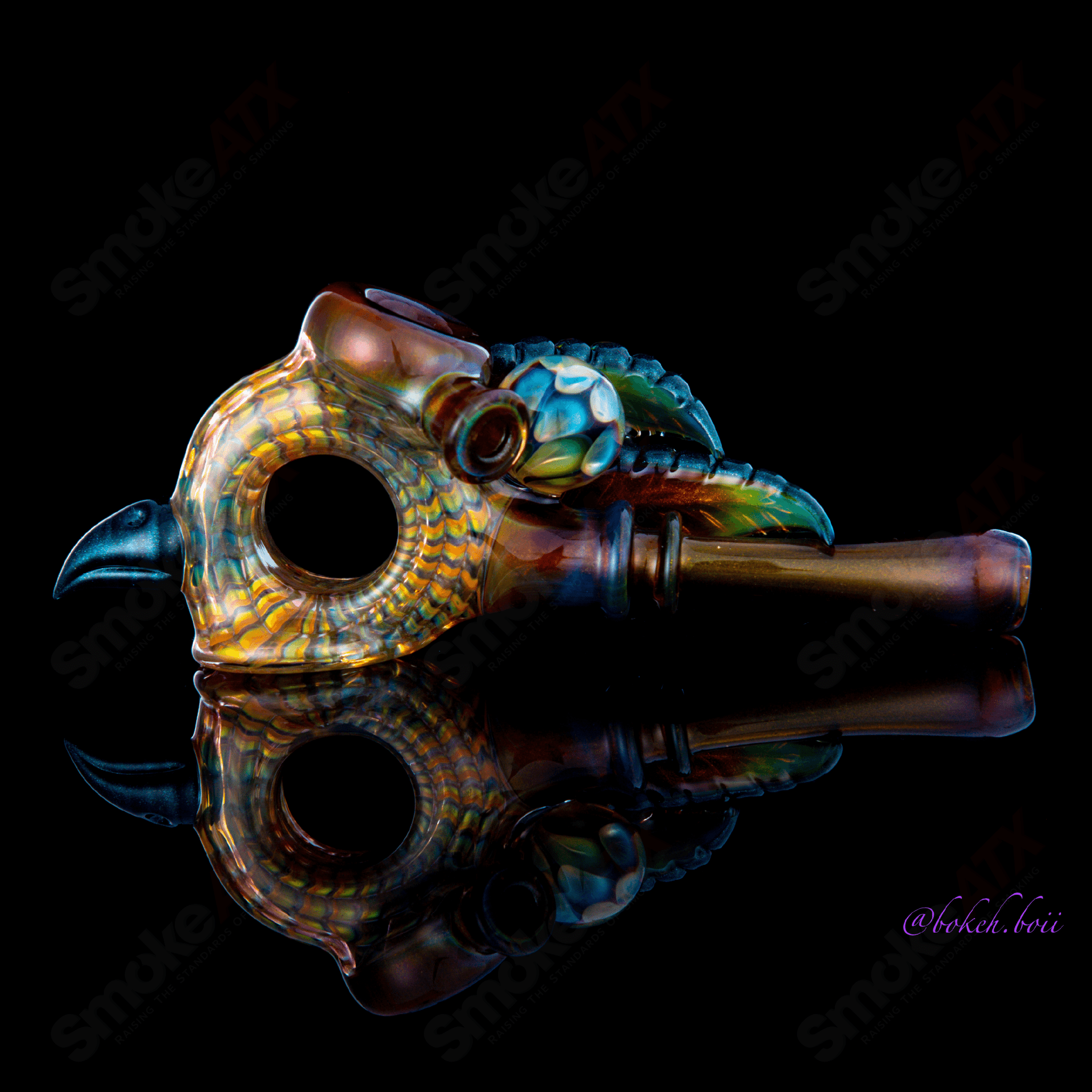Calmbo X Dosh Wrap and Rake dry glass pipe with intricate design, handcrafted heady glass hand pipe for smoking.