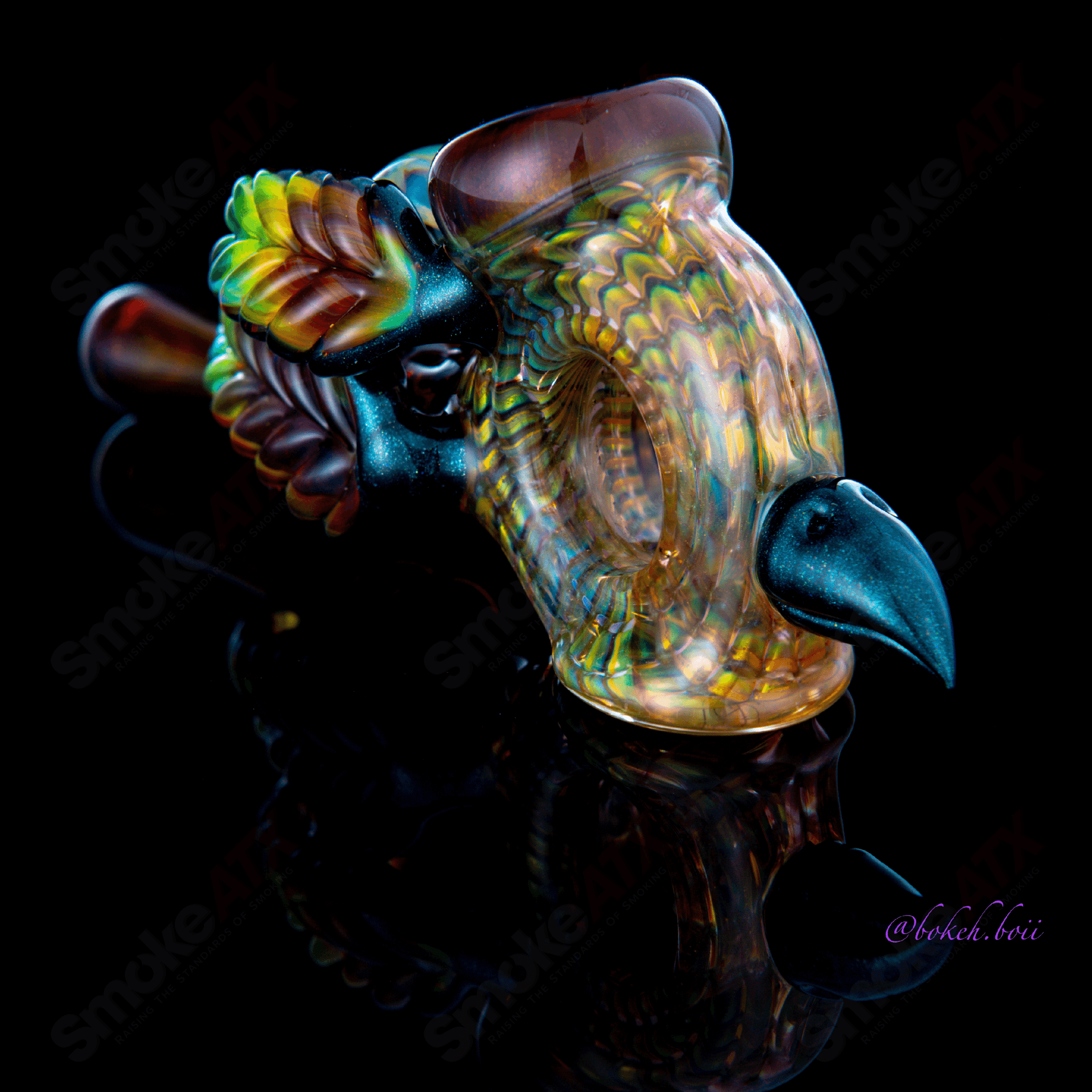 Calmbo X Dosh Wrap and Rake dry pipe made of heady glass with intricate wrap and rake design for smoking.