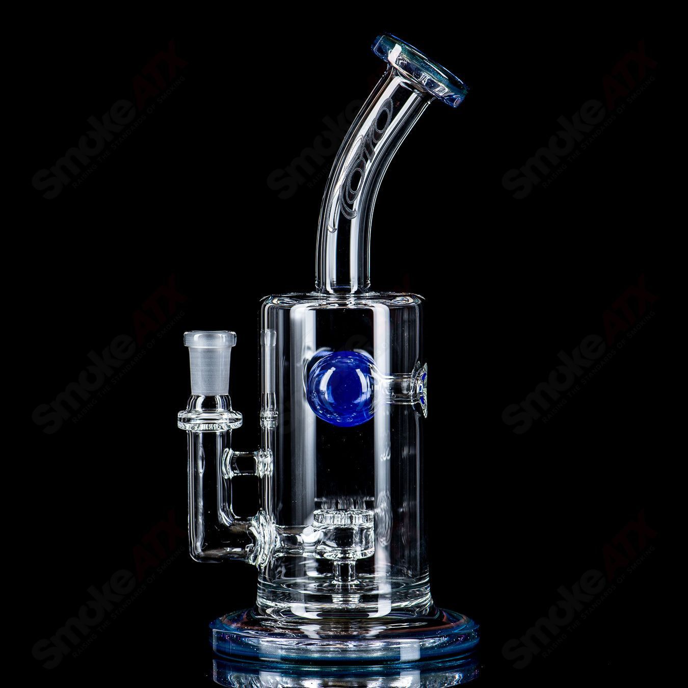 Toro Glass 10mm Jetperc full color ball concentrate rig featuring a heady glass design with vibrant colors and a rounded shape.