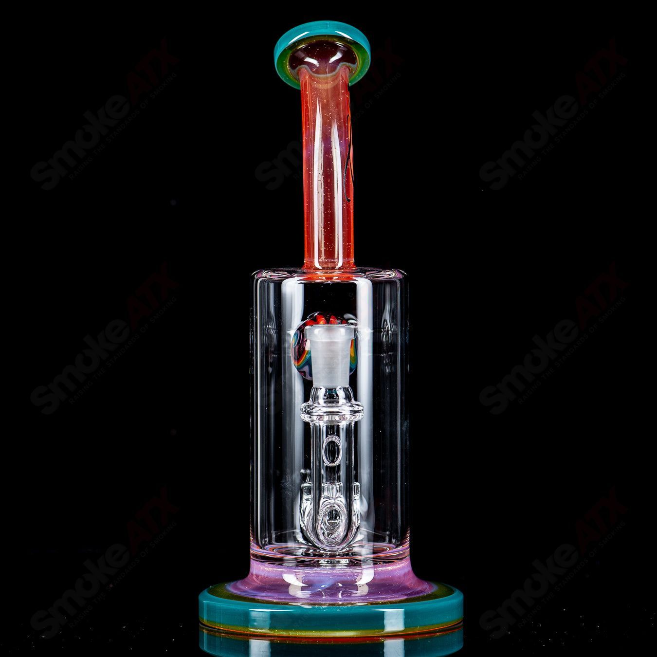 Toro 10mm Jetperc full-color foot/mouthpiece heady glass concentrate rig with colorful design and clear glass accents.