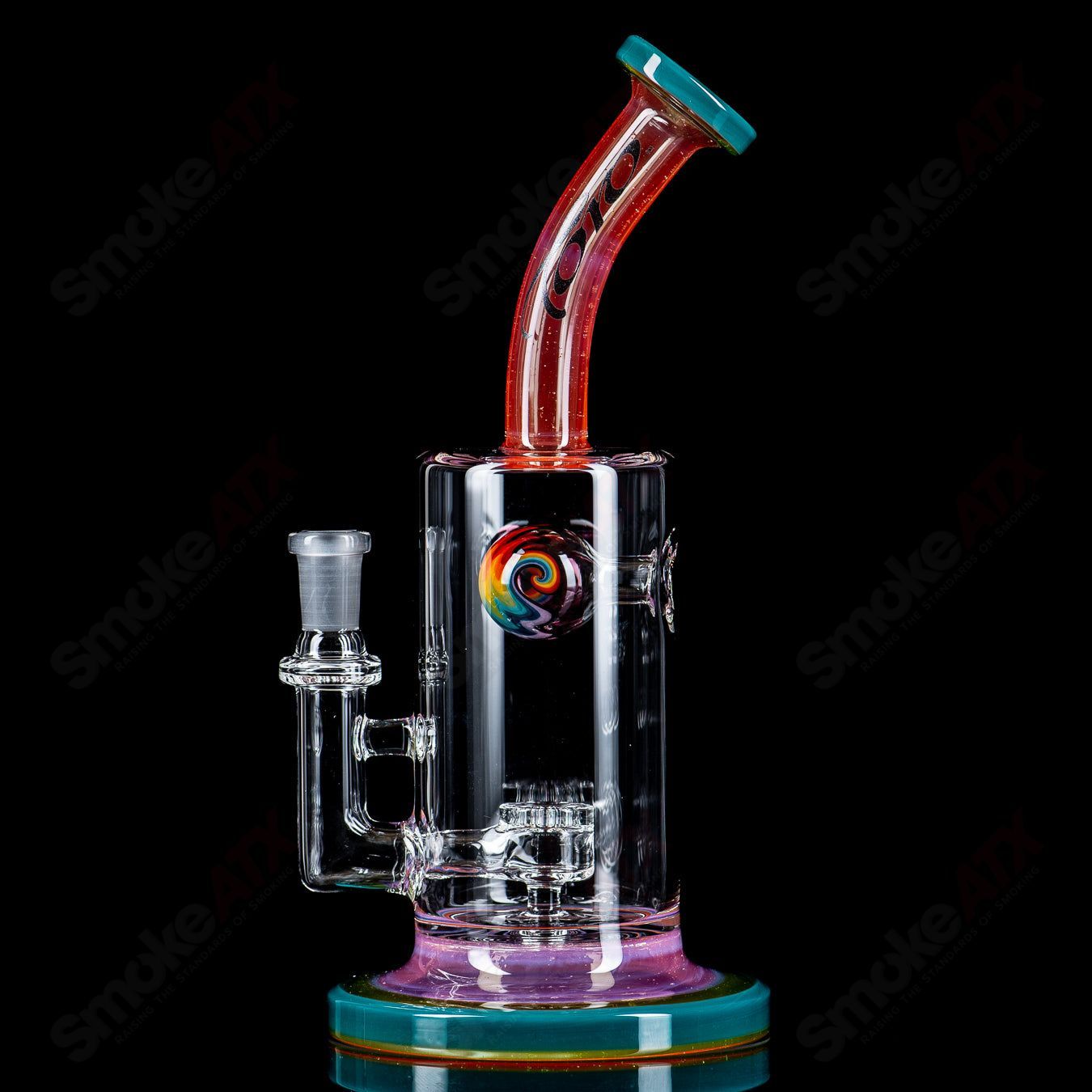 Toro Glass 10mm Jetperc full color foot/mouthpiece for concentrate rig, featuring vibrant design and clear glass components.