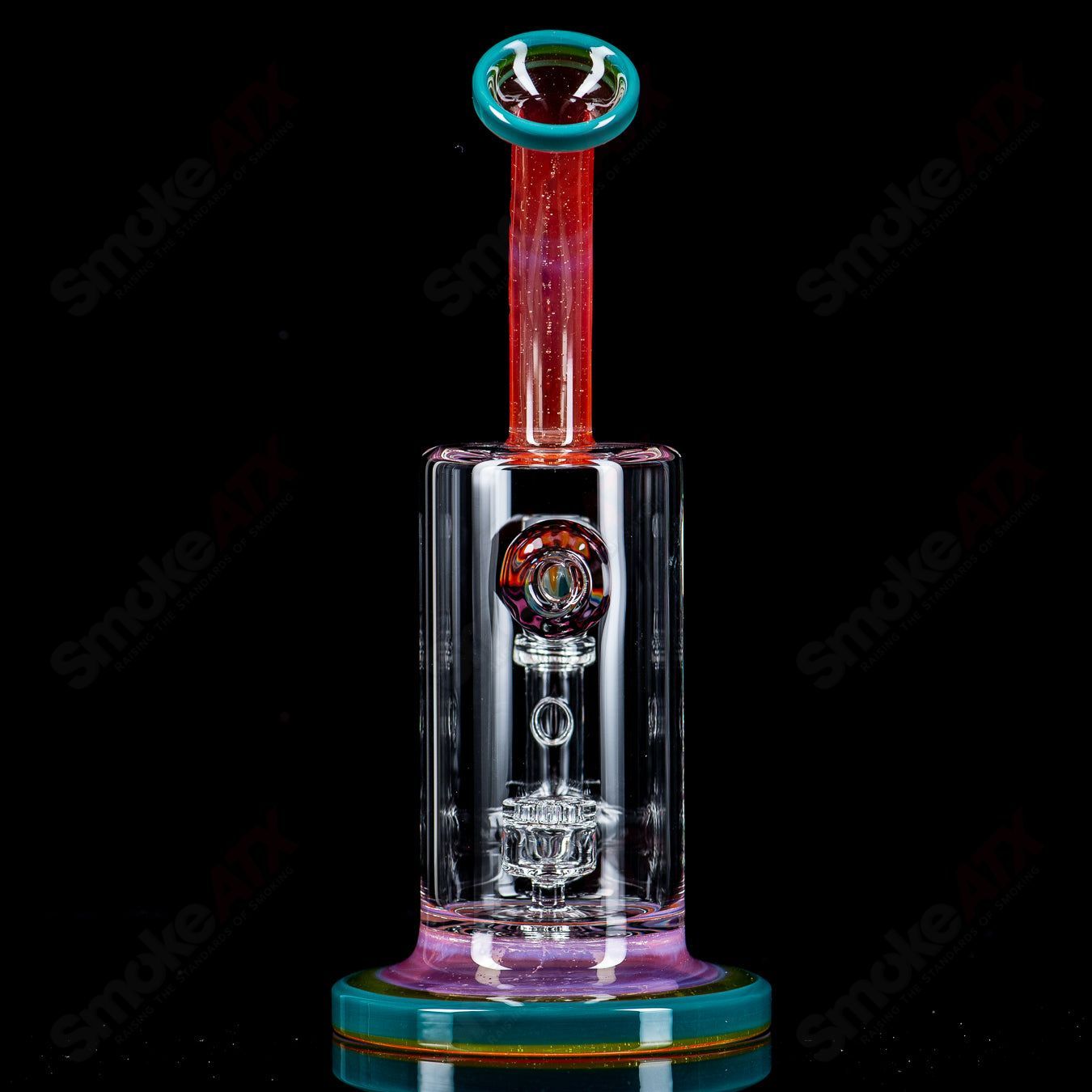 Toro Glass 10mm Jetperc full-color foot/mouthpiece for concentrate rig, featuring vibrant design on heady glass rig.