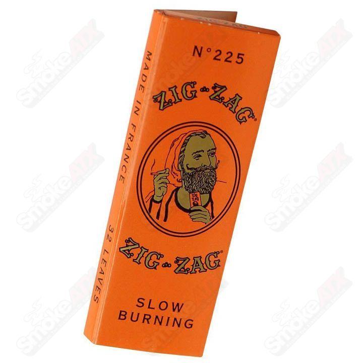 Zig Zag French Orange Zig Zag rolling papers, 1 1/4 size, featuring vibrant orange design and zig zag pattern for rolling.