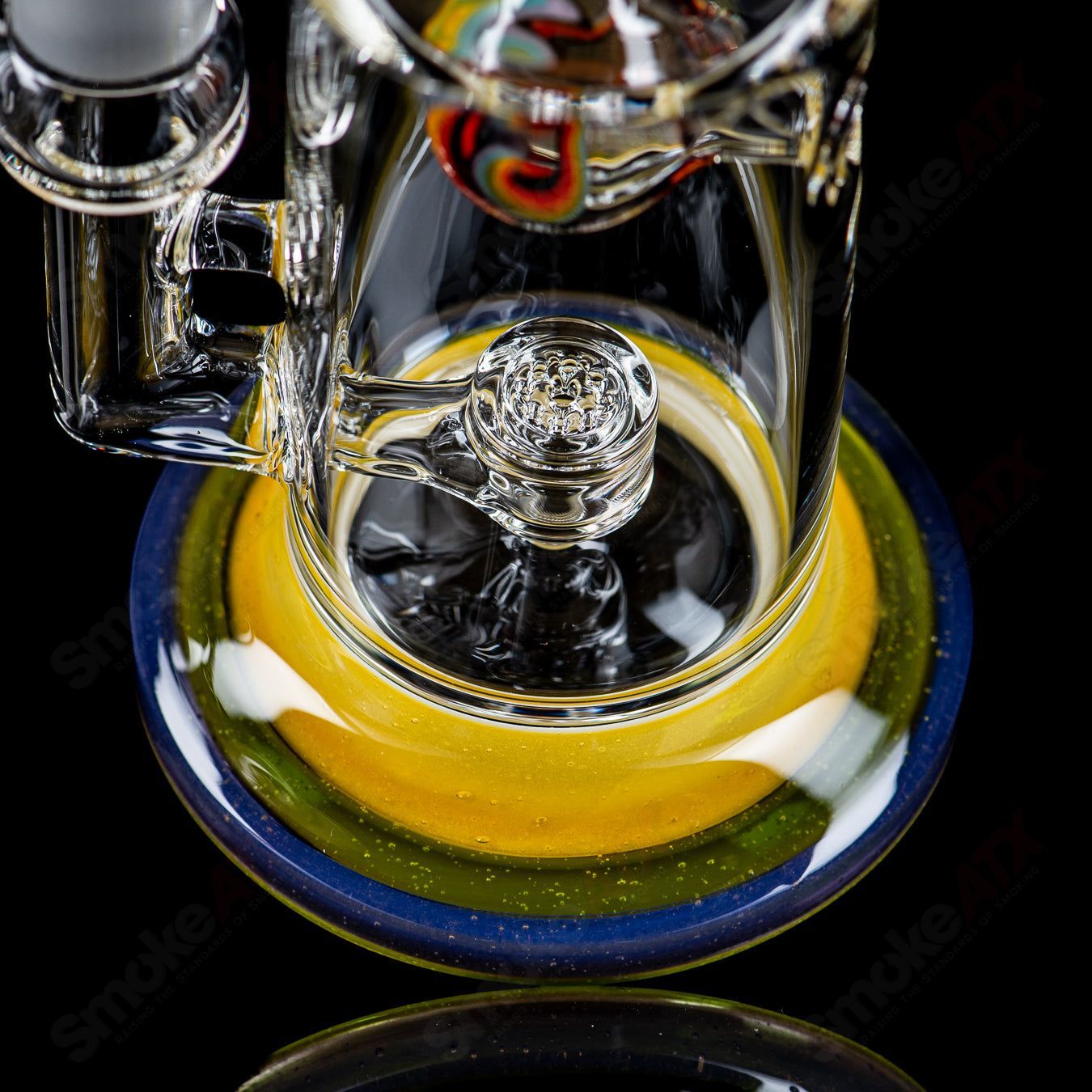 Toro Glass 14mm Jetperc full-color foot/mouthpiece for concentrate rig, heady glass design with vibrant colors and intricate detail.