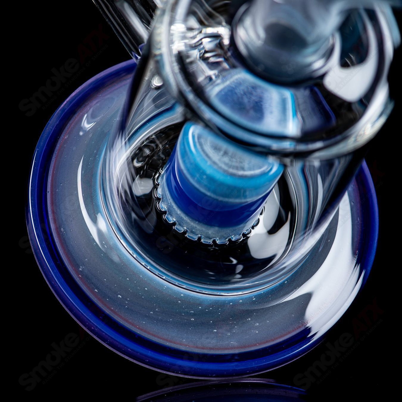 Toro 14mm single froth concentrate rig made of glass, featuring a clear design with intricate details for concentrate use.