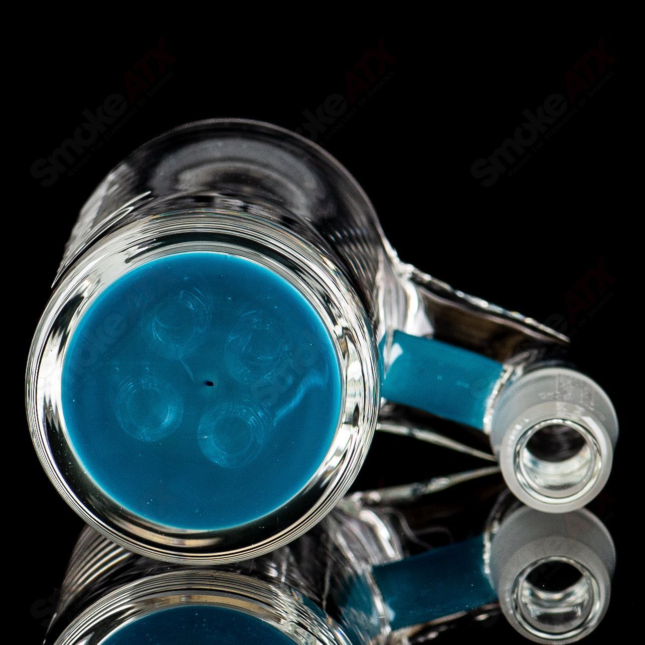 Sovereignty Glass 4-arm color accent ash catcher with vibrant glass accents and clear glass arms, designed for smoking accessories.
