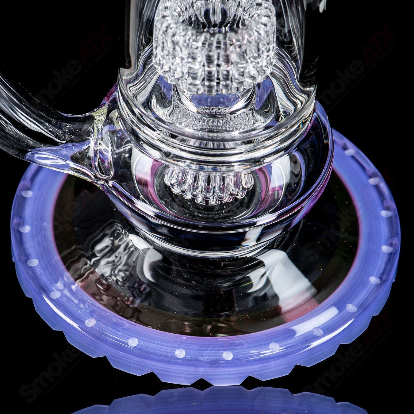 Glass waterpipe from Mobius V5 Hybrid Series with stereo matrix design, featuring clear glass and intricate craftsmanship.