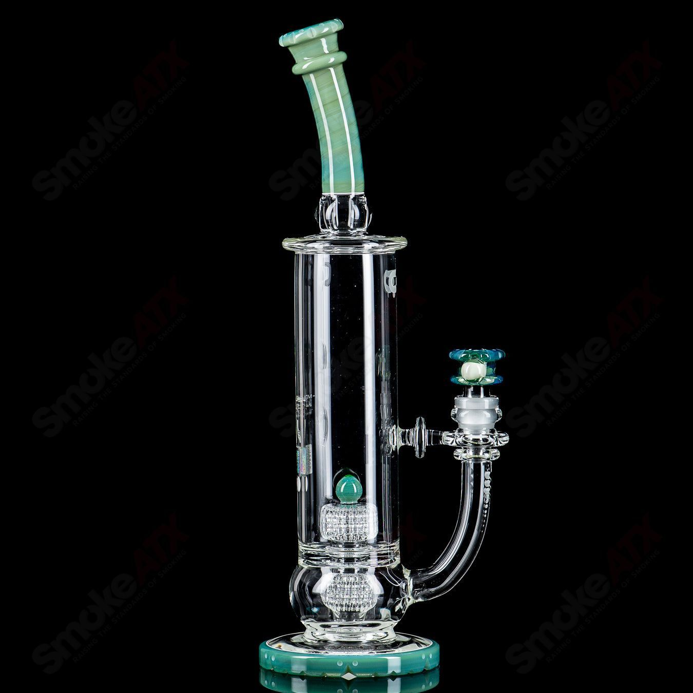 Mobius 65T V5 Hybrid Series stereo matrix glass waterpipe with intricate design and clear glass construction.