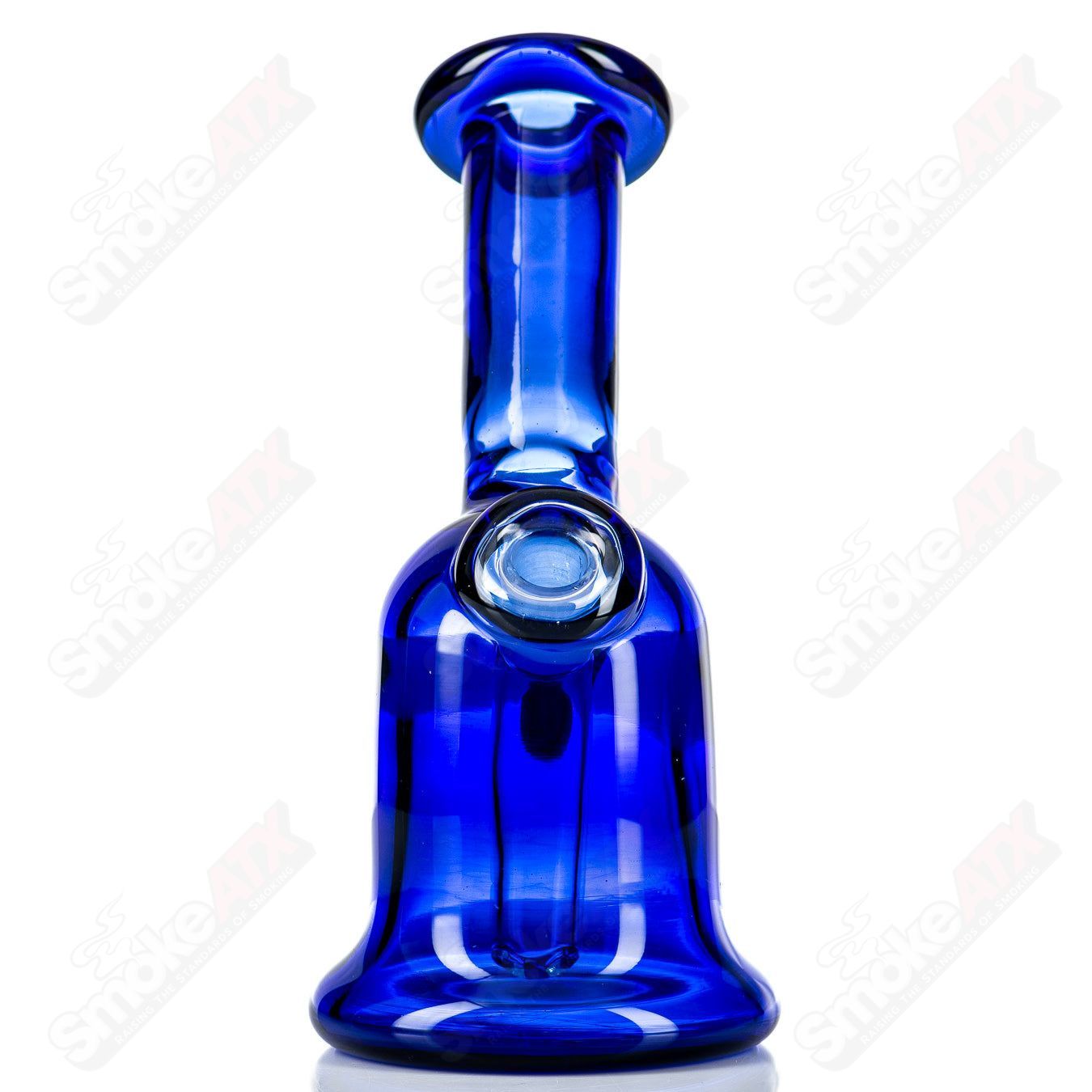 Cobalt glass layback rig by Nancy Glass, a stylish glass accessory with intricate details and a smooth, curved design.