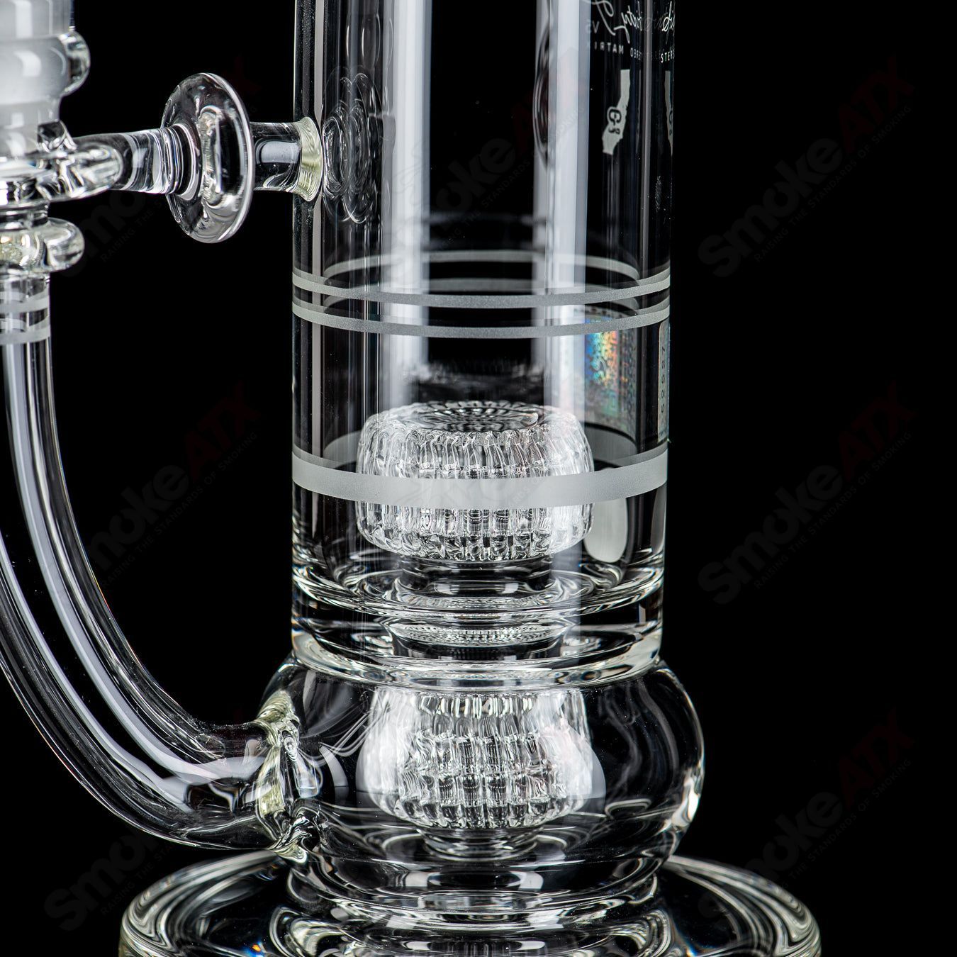 Mobius Cold Worked 60T V5 Stereo Matrix glass waterpipe with intricate design and clear glass construction.