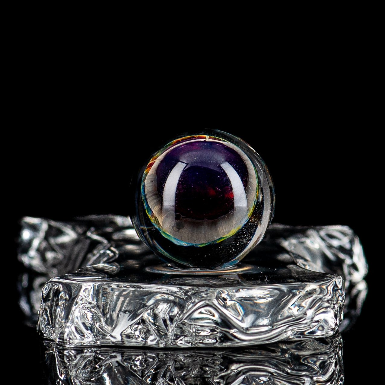 Faceted Slurper Topper Collab Indo x Fatal Facets heady glass marble with intricate faceted design and colorful patterns.