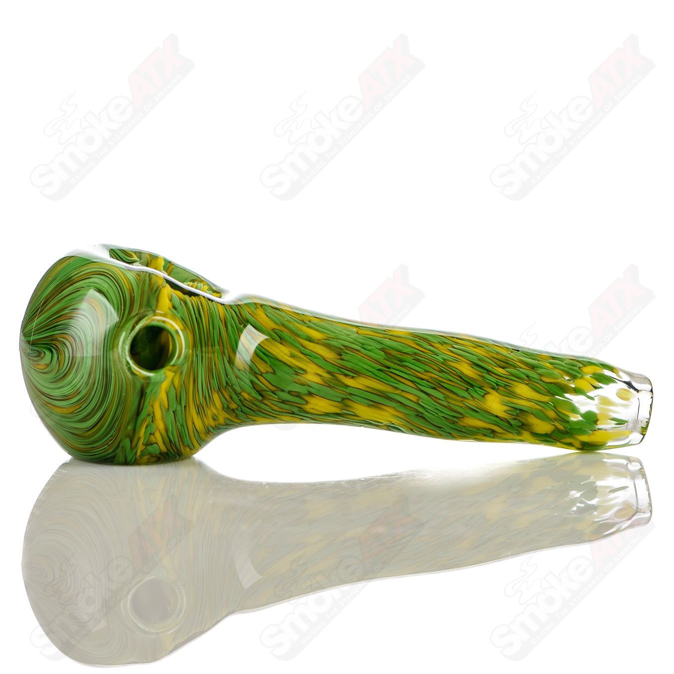 Green and yellow worked frit glass pipe spoon signed by JMK Glass, featuring colorful design and intricate glasswork.