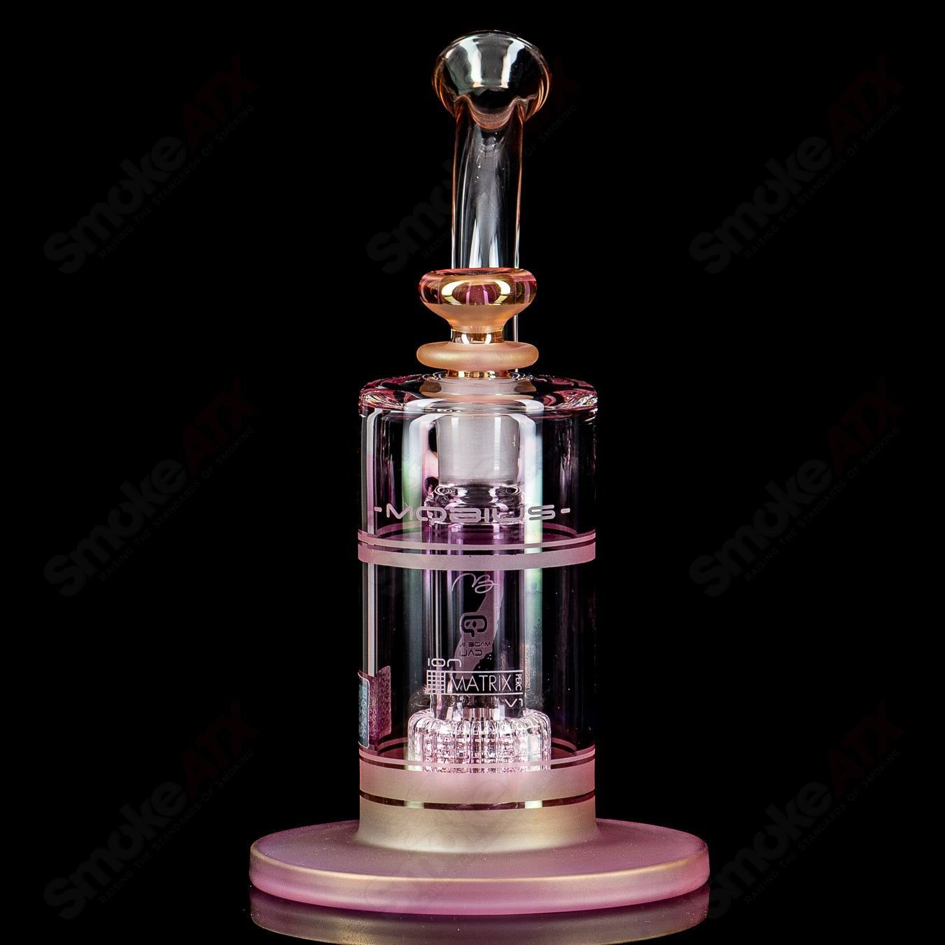 Mobius Ion Matrix V1 Hybrid Series glass waterpipe with sleek design and clear glass body, featuring intricate matrix pattern.
