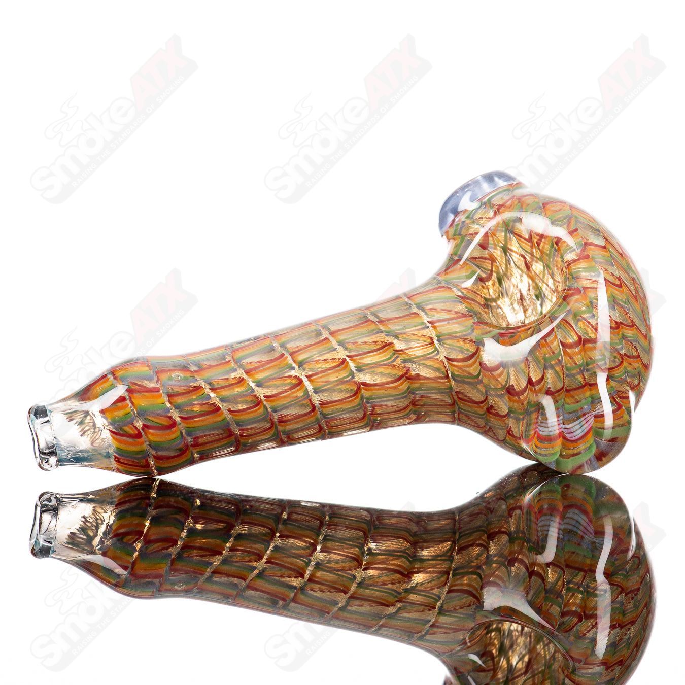 JMK Glass lattice coil spoon hand pipe with intricate glass lattice design and coil details, clear and colorful glass craftsmanship.