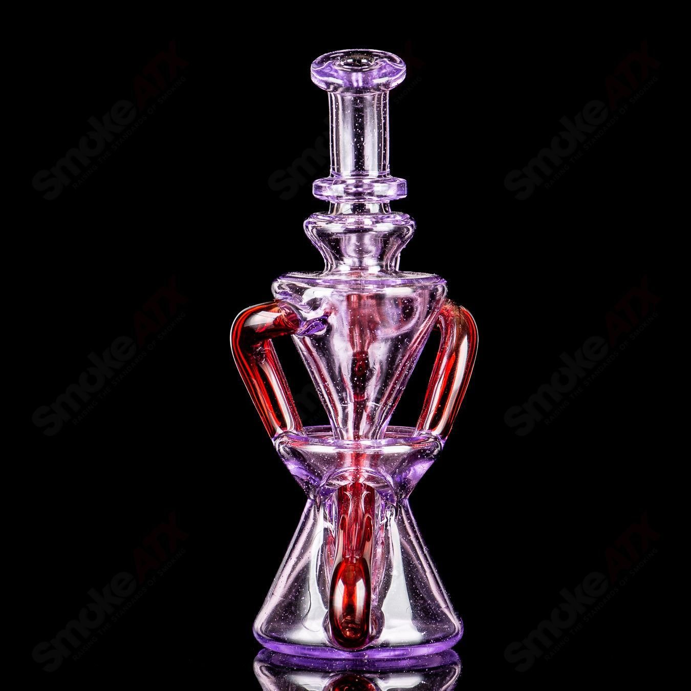 Mini Two & Through Recycler by Captn Chronic, heady glass recycler with intricate design and vibrant colors, showcasing craftsmanship.