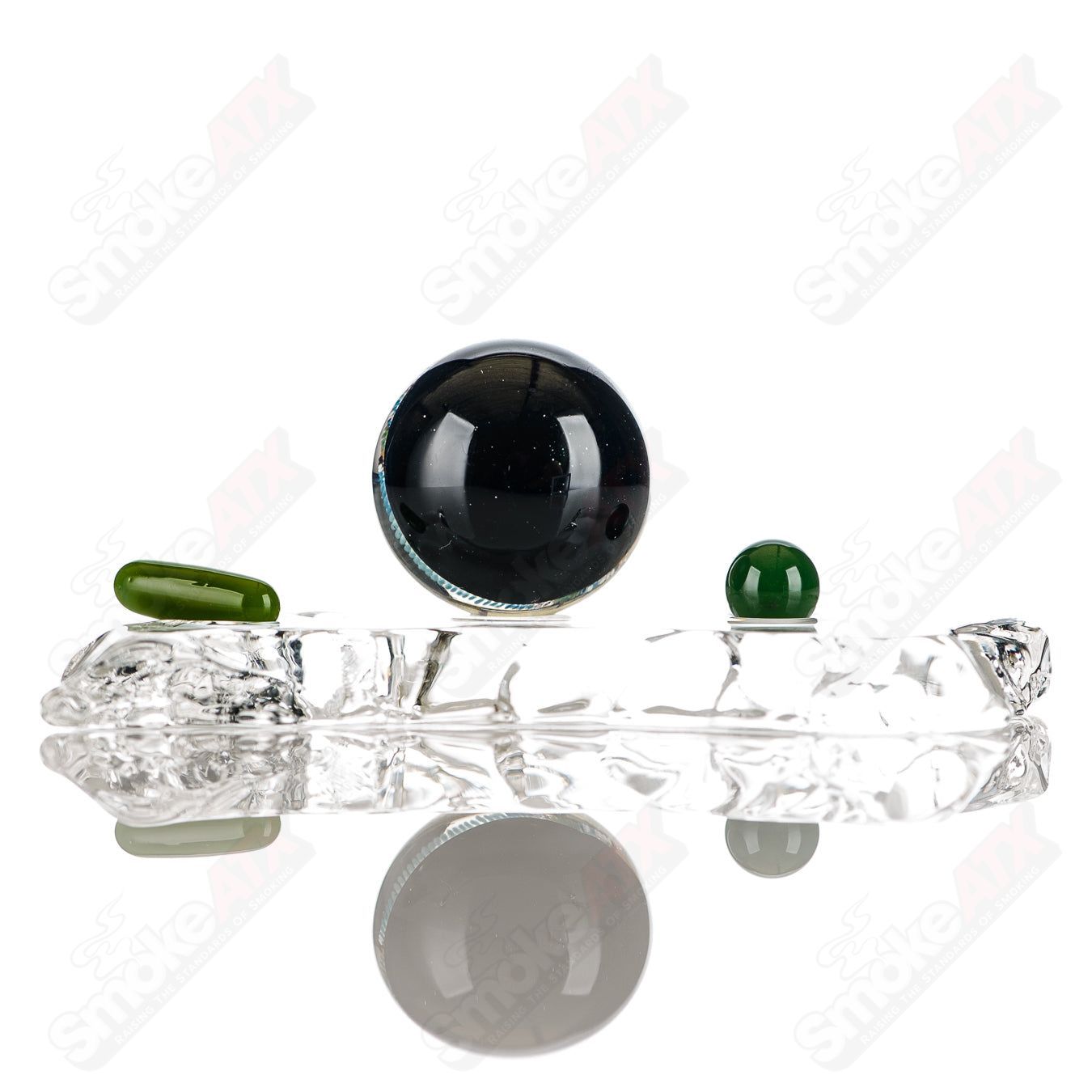 Colorful Mountain Slurper marble attached to a JH Glassworks heady glass slurper set, featuring intricate glasswork and vibrant design.
