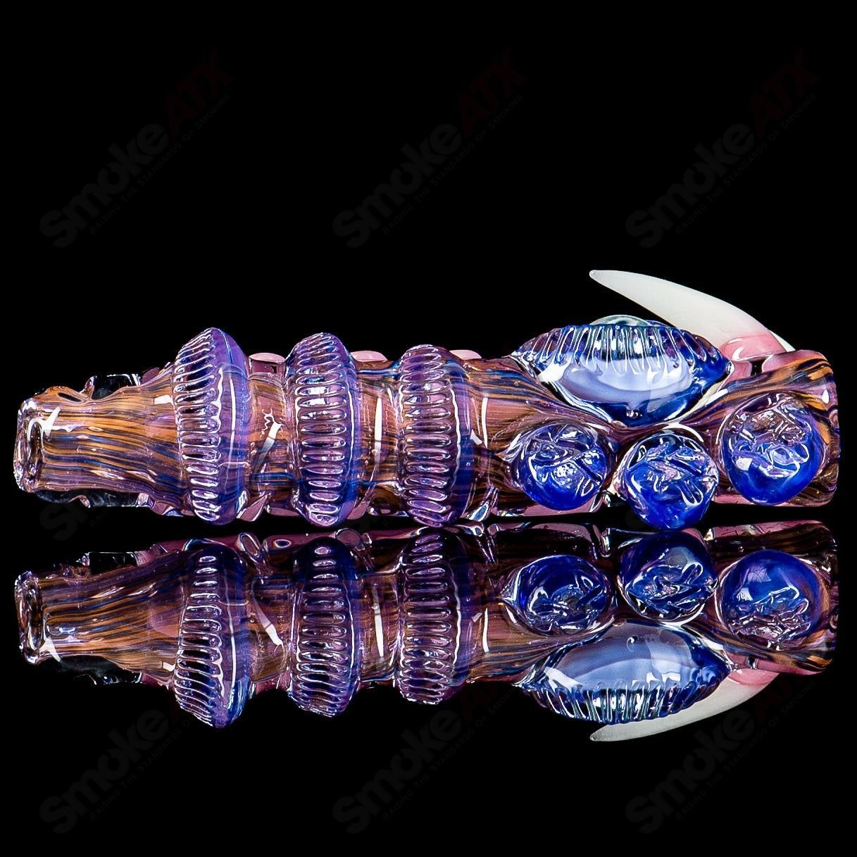 Onie by Nobody Glass x Salt Chillums, colorful heady glass pipe with intricate design, used for smoking.