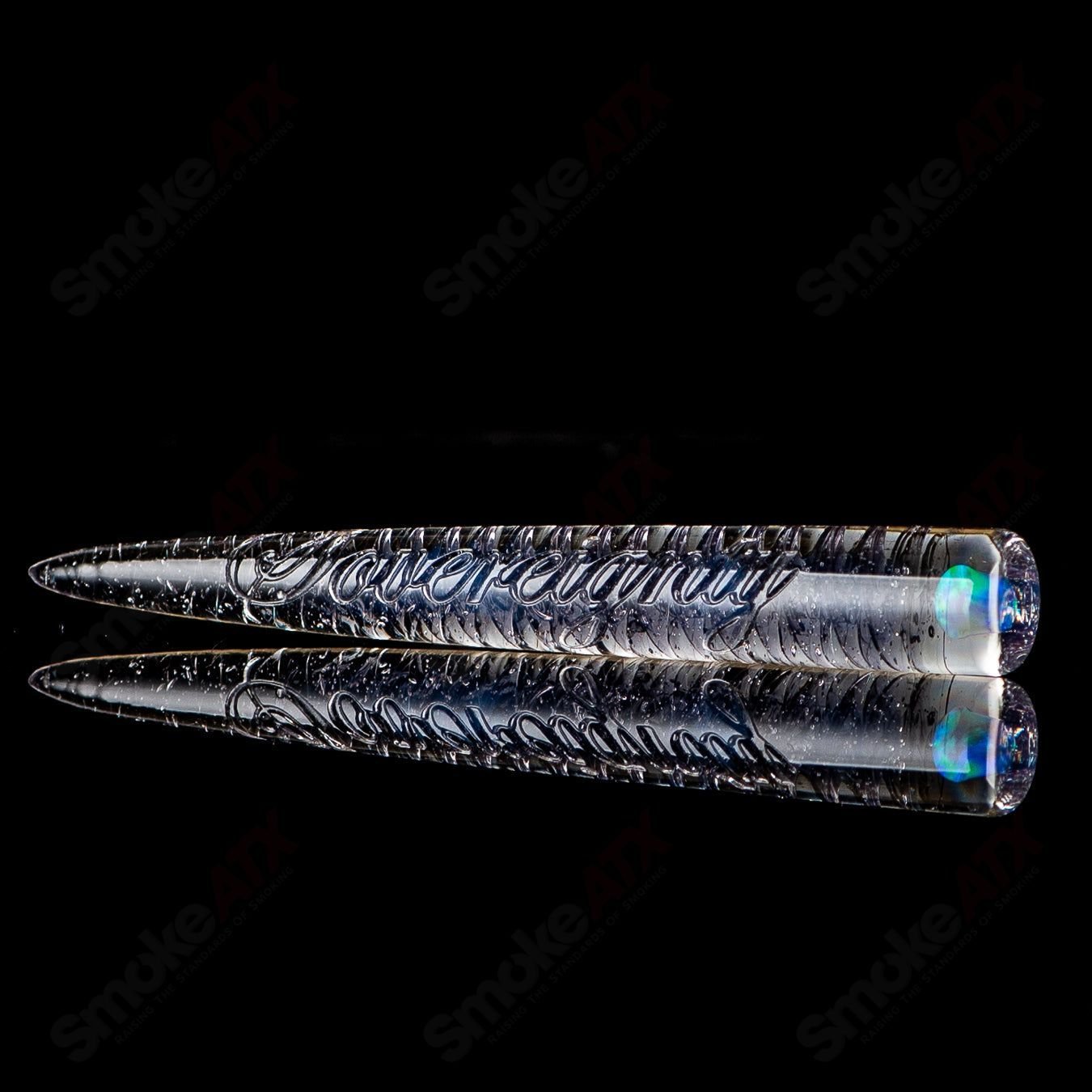 Sovereignty Glass Opal Accent Spiral Poker Tool, a heady glass accessory with colorful opal details and intricate spiral design.