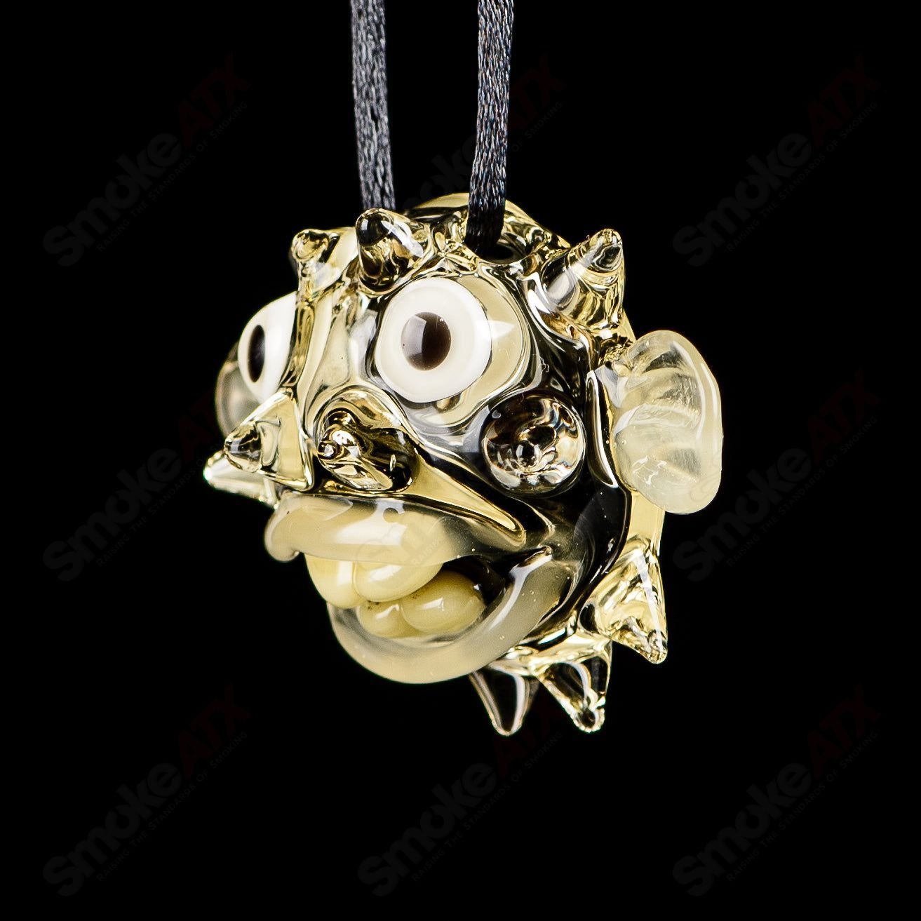 Chadd Lacy Glass puffer pendant, heady glass jewelry piece with intricate lacy glass design and vibrant colors.