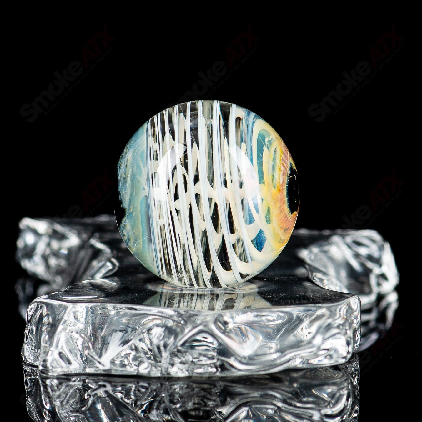 Colorful Skull Eye Mili Top Mib Indo Glass heady glass with intricate marbles and detailed skull and eye design.