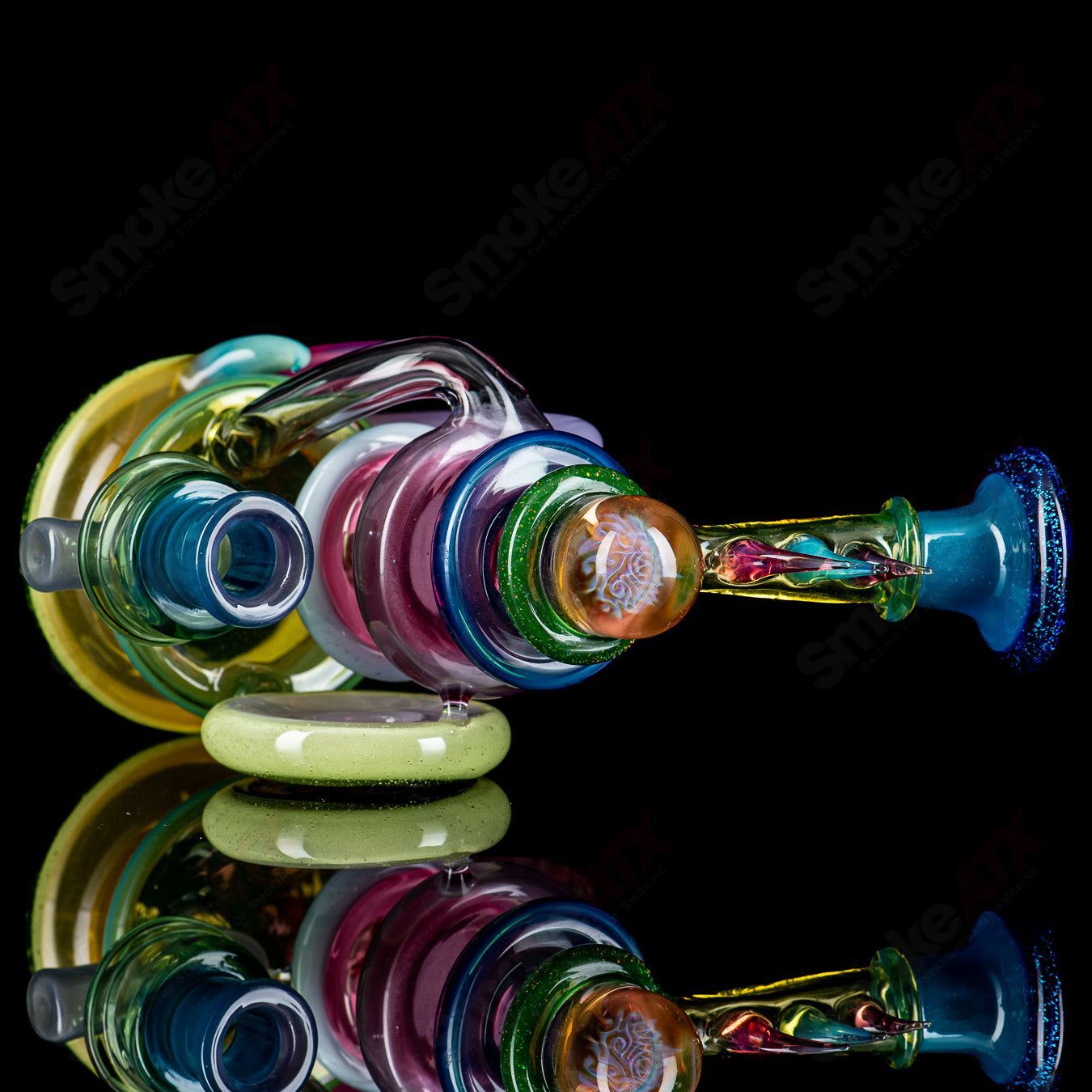 Freeek Glass Terpcycler Rig, heady glass recycler with intricate designs and clear glass construction for dabbing and concentrates.