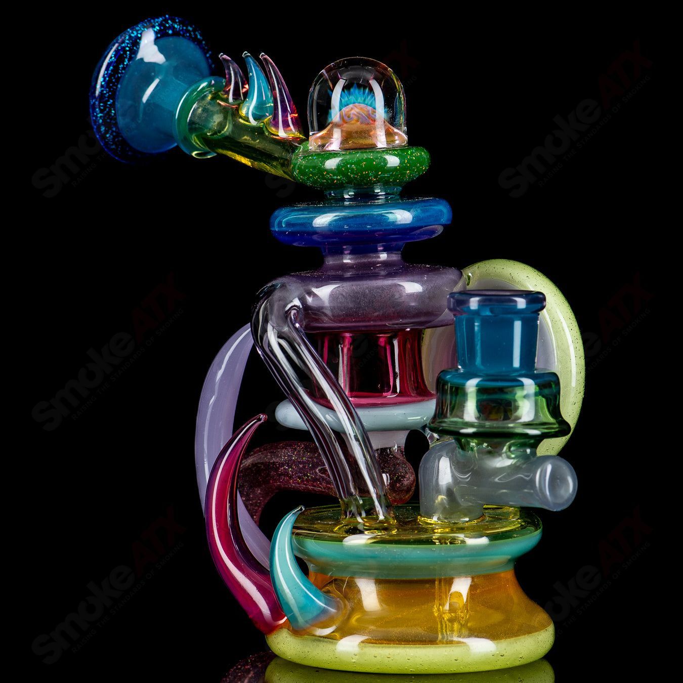 Freeek Glass Terpcycler Rig, a heady recycler glass piece with intricate design and clear glass construction.