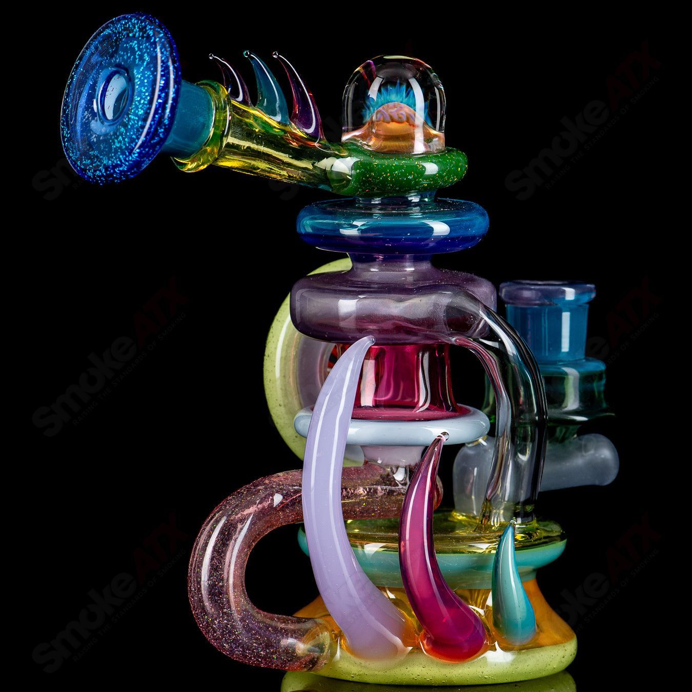 Freeek Glass Terpcycler Rig, a heady recycler glass bong with intricate glasswork and clear design, ideal for dabbing and concentrates.