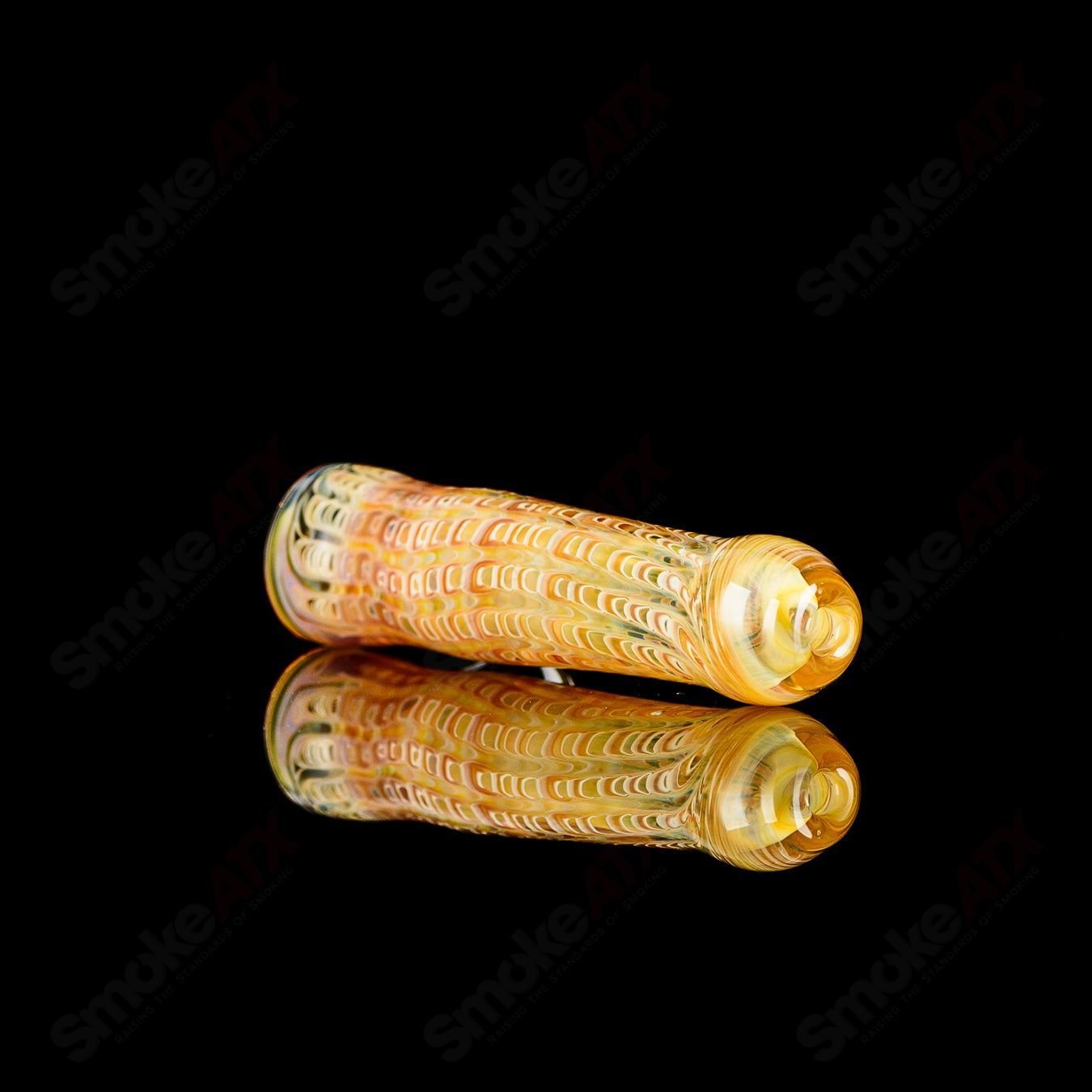 Transparent worked glass chillum with clear dot signature by JMK Glass, showcasing intricate design and craftsmanship.