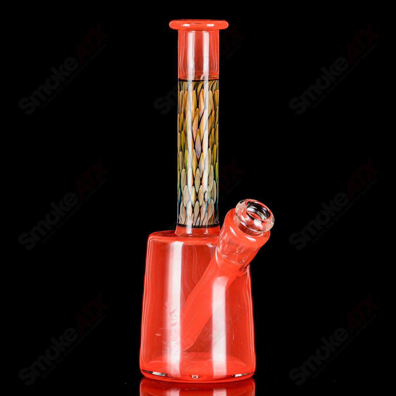 BCM Glass UV Mini Rig, a heady glass concentrate rig with colorful UV-reactive design and intricate glasswork.