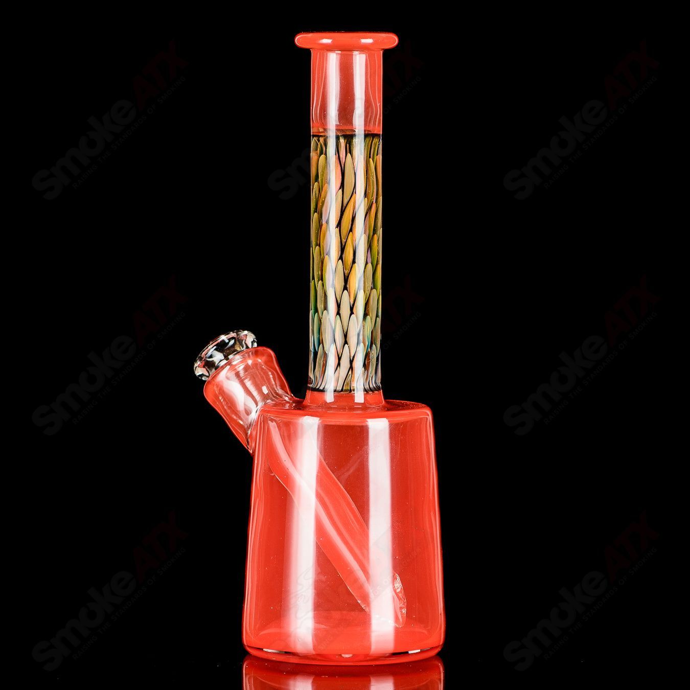 BCM Glass UV Mini Rig, a heady glass concentrate rig with vibrant UV accents and intricate design details.