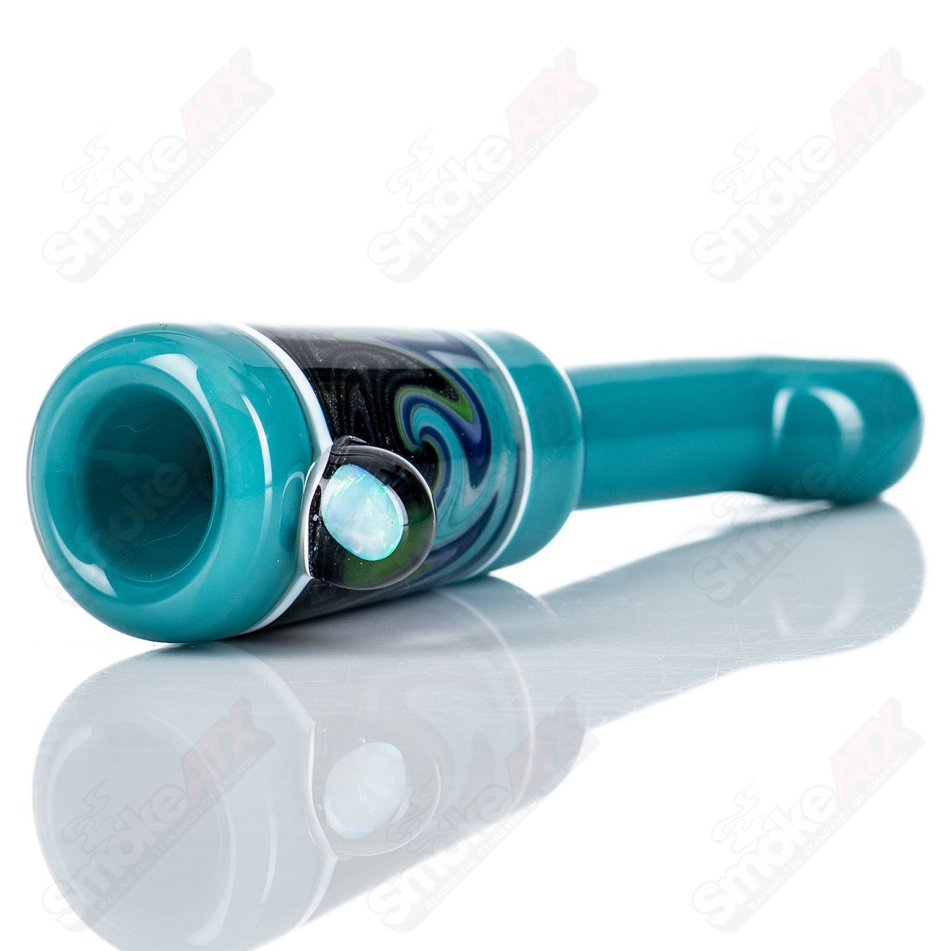 Colorful wig wag chillum by Kirkland Glassworks featuring intricate glass patterns and smooth curves.
