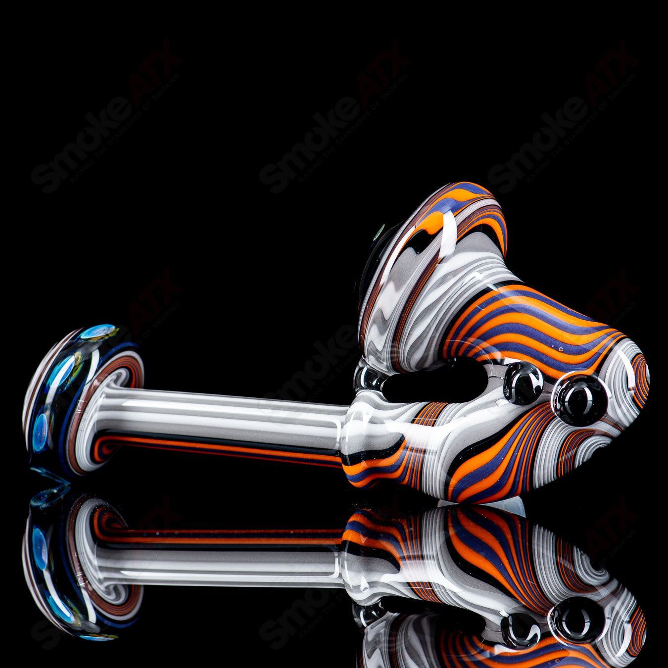 Glass Wig Wag Dry Pipe by Chaz Pyle featuring a colorful, intricate design and smooth mouthpiece for dry herb smoking.