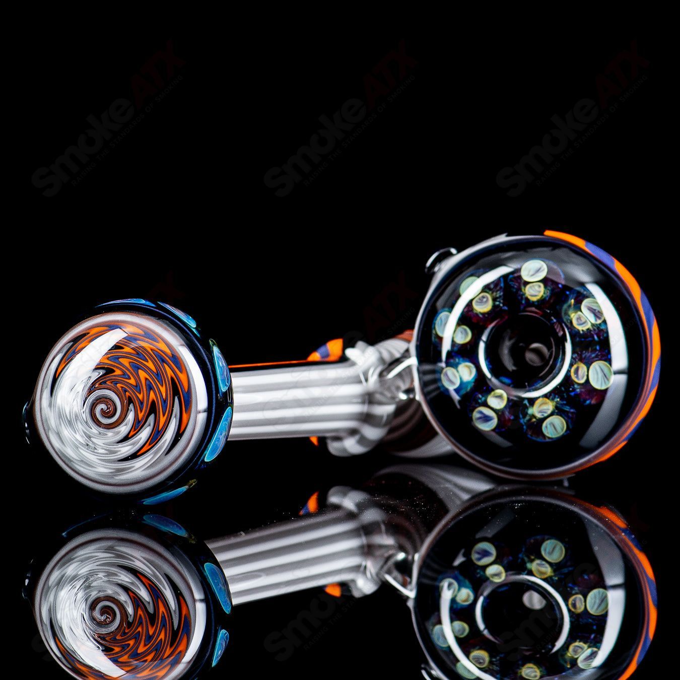 Chaz Pyle Wig Wag Dry Pipe made of glass, featuring a unique wig wag design with colorful glass accents for smoking.