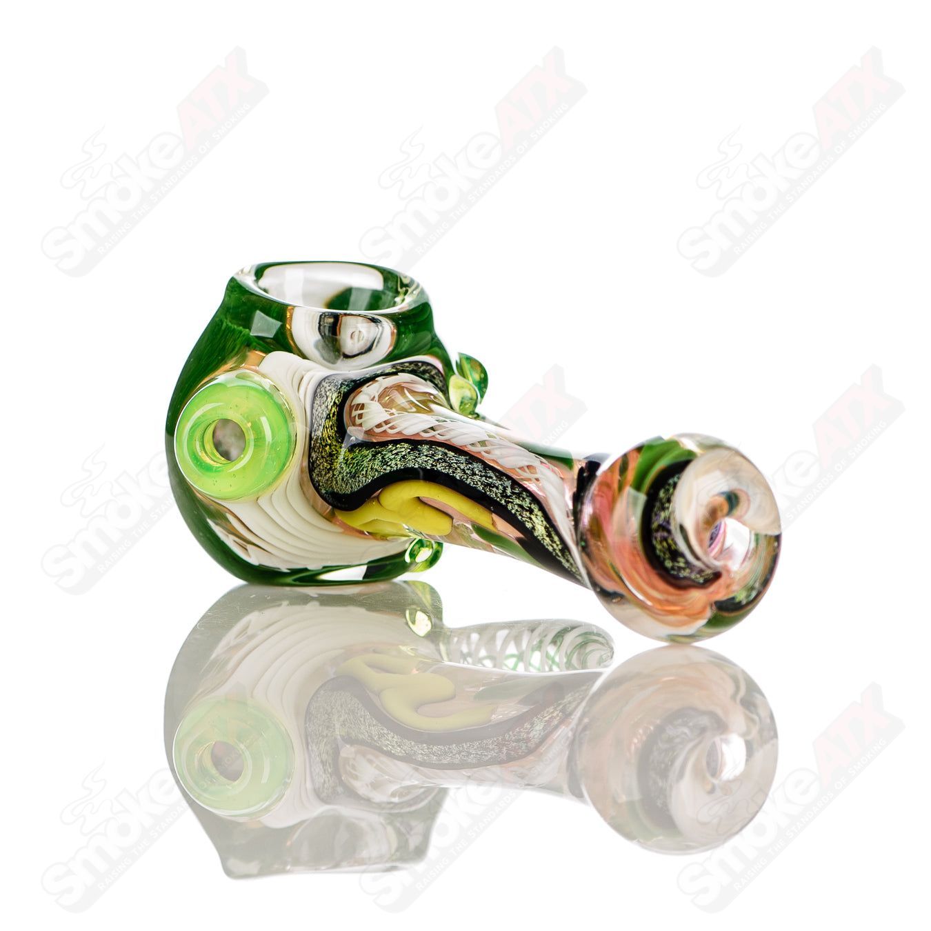 Colorfully worked IO spoon hand pipe by Jeremy from Oregon featuring intricate 10-color design and clear glass details.