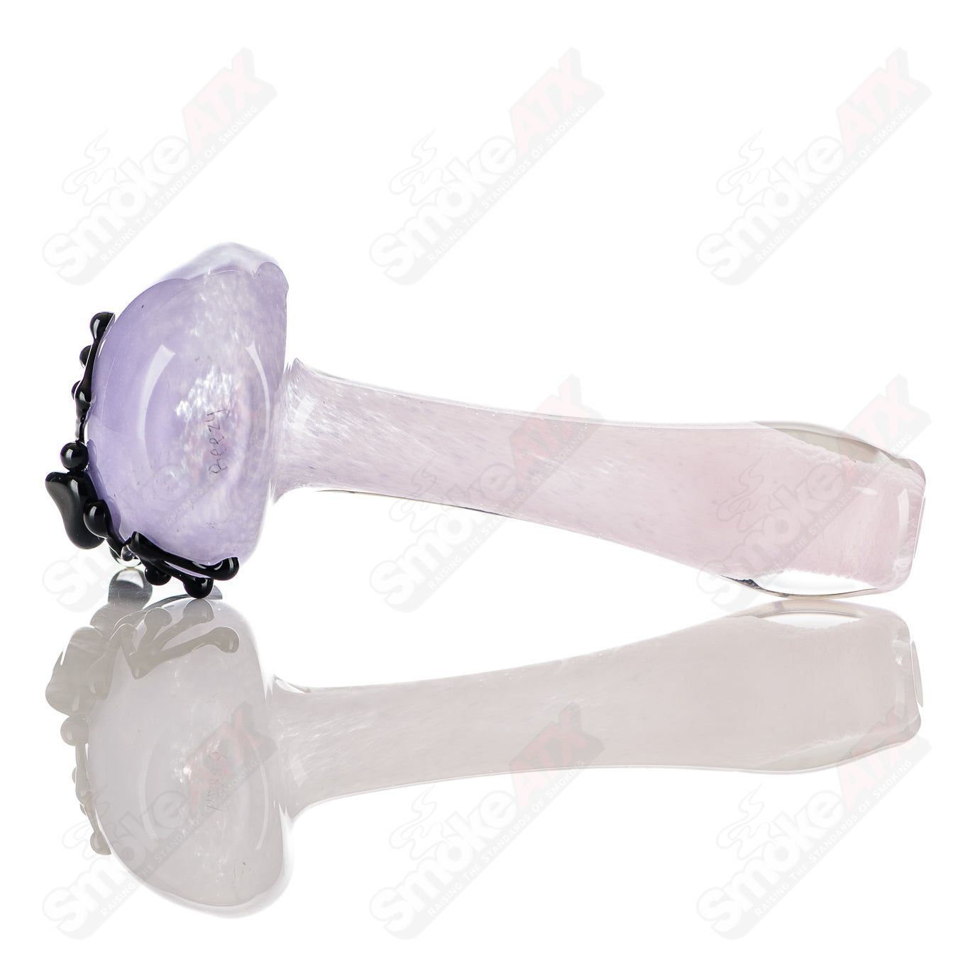Beezy Glass #10 Frog Spoon pipe made of clear glass with a frog-shaped bowl and smooth curved design.