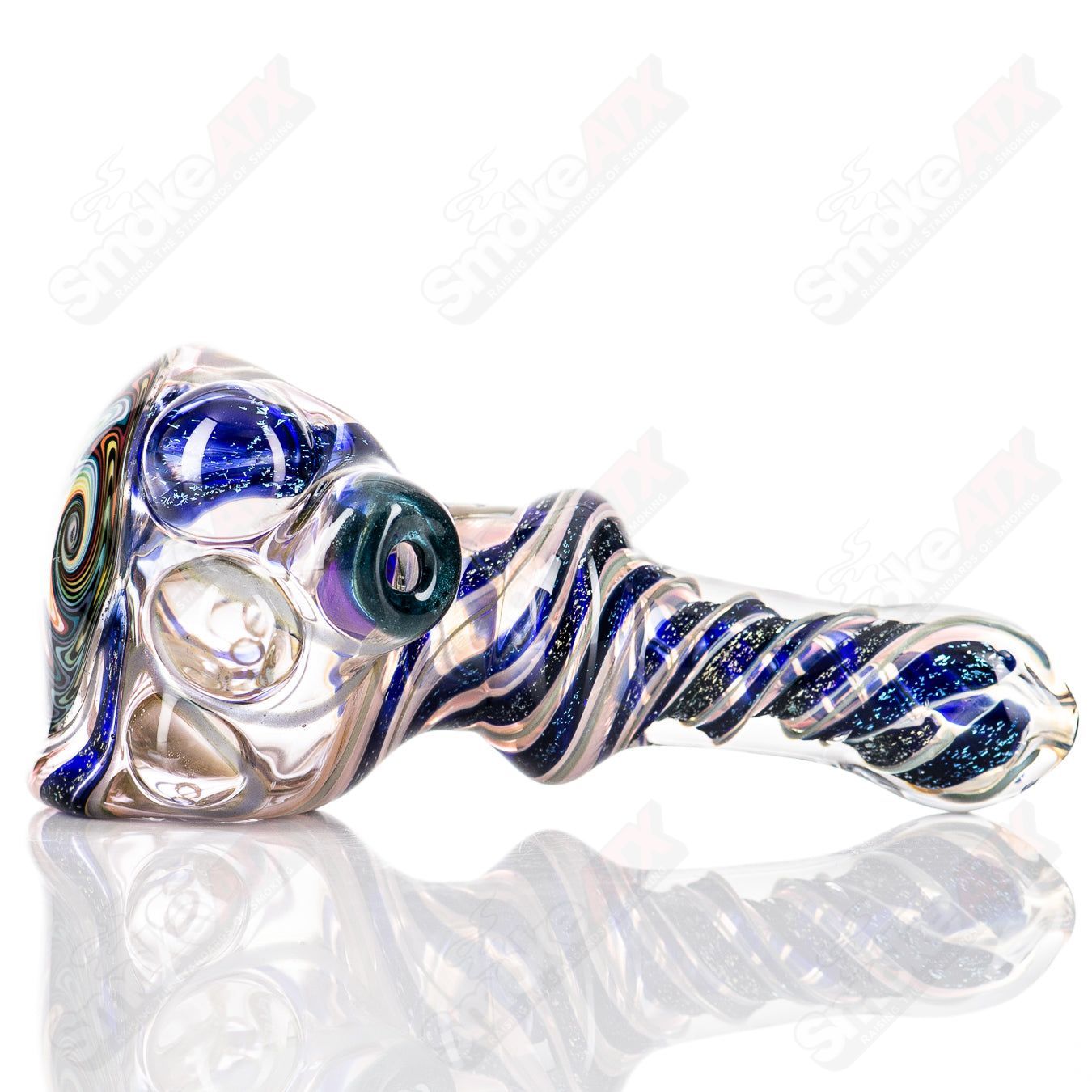 Molten Imagination #10 ISO Dichroic UV Spoon showing a colorful, reflective glass tool with iridescent surface for artistic use