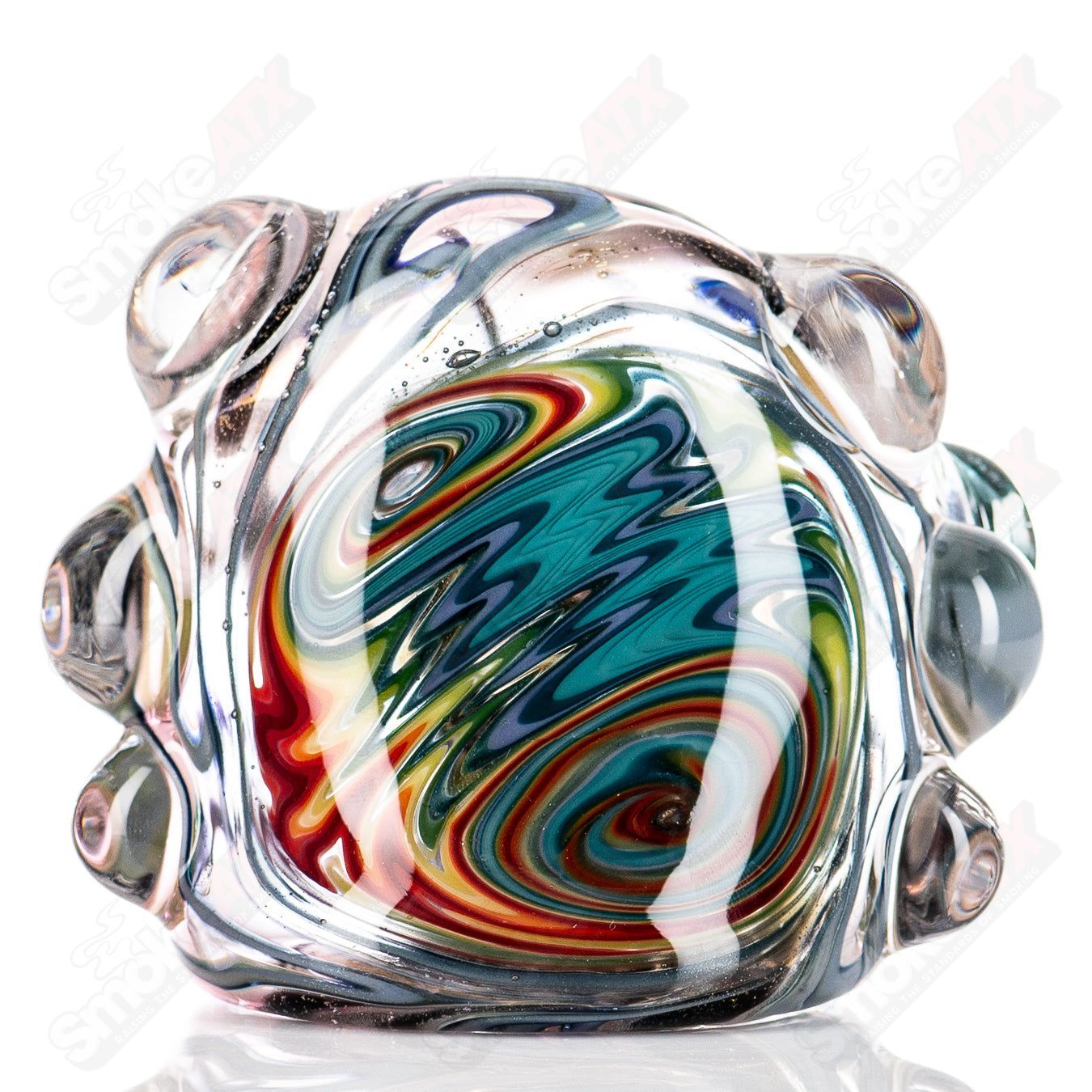 Molten Imagination #10 ISO Dichroic UV Spoon with multicolored iridescent glass surface used for jewelry making.