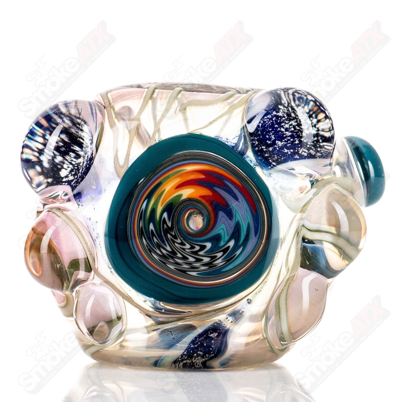 Molten Imagination #10 ISO Dichroic UV Spoon showing a colorful, reflective glass art tool with a smooth, curved surface.