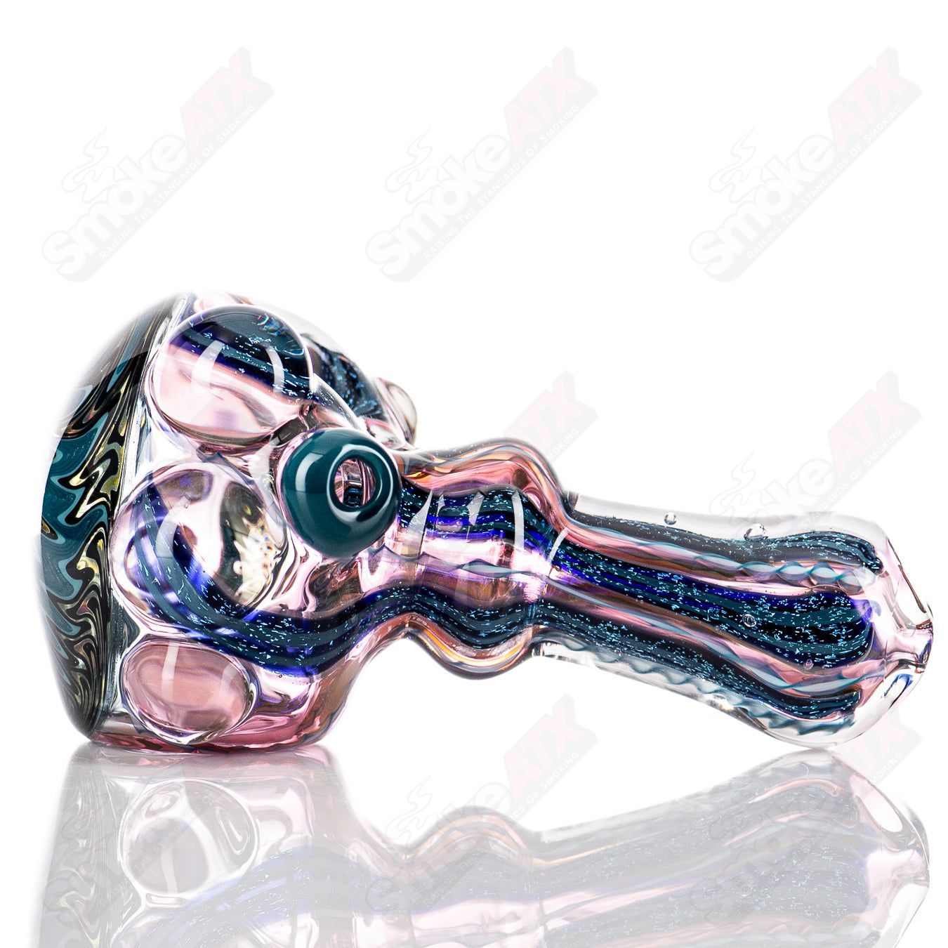 Molten Imagination #10 ISO Dichroic UV Spoon, a small tool with colorful dichroic effects for UV applications.