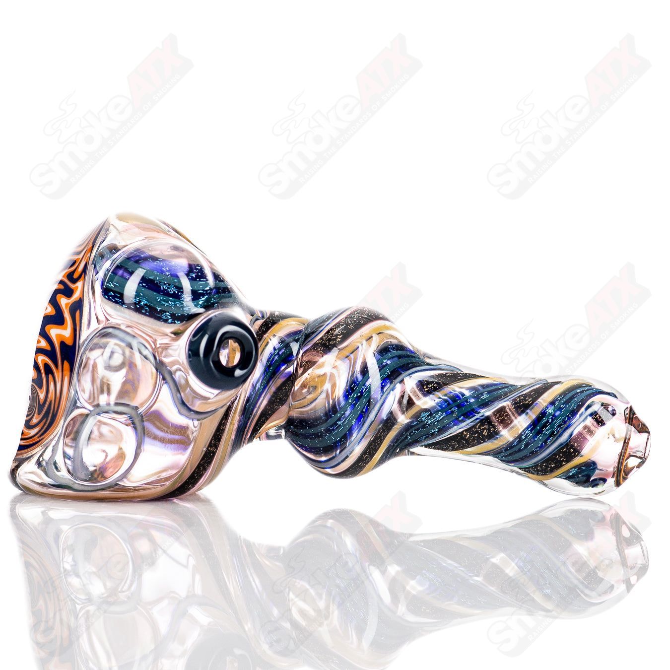 Molten Imagination #10 ISO Dichroic UV Spoon, unclassified, showing the colorful, reflective surface under UV light.