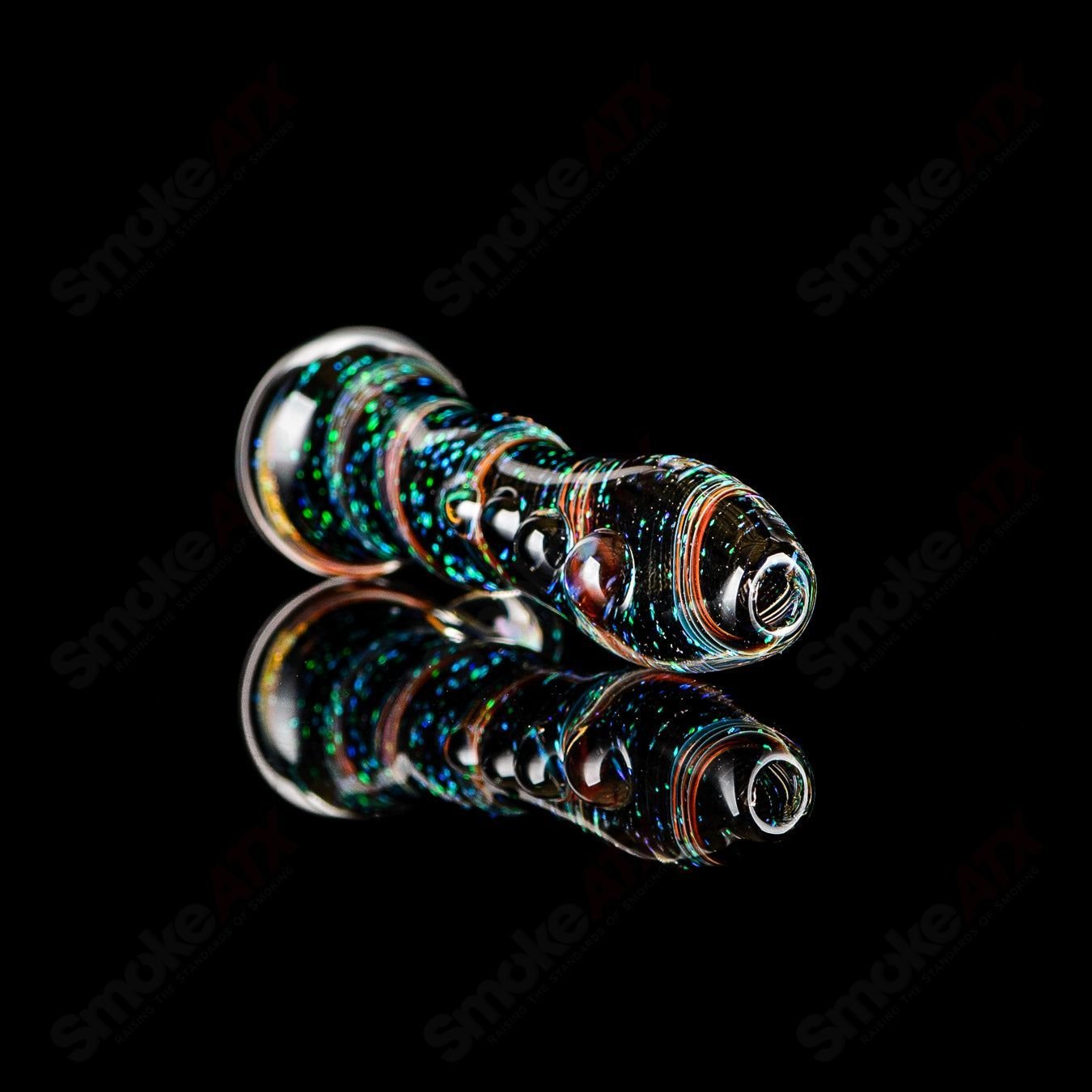 Clear glass #10 Opal Hitter Chillum by Rotational Science with swirling opal design, small handheld smoking pipe.