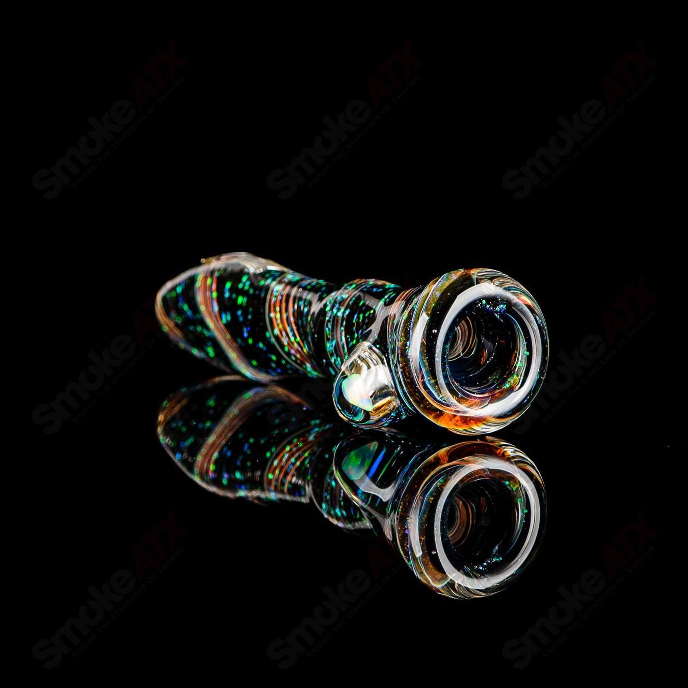 Glass chillum pipe from Rotational Science with a colorful #10 opal hitter design, showcasing a smooth, hand-blown piece.