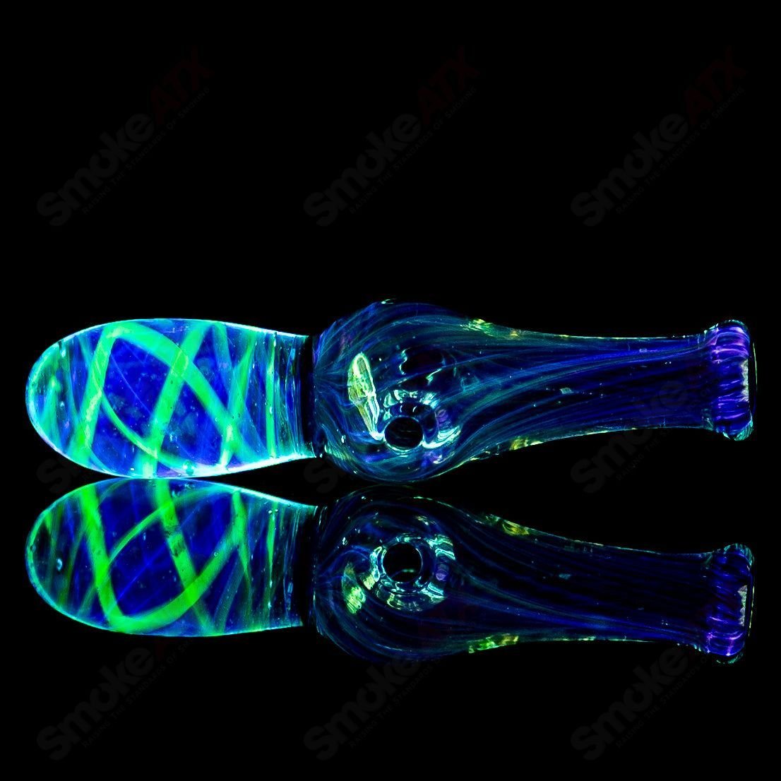 Colorful UV-reactive Puffco joystick headpiece from Geoff Made Glass, designed for Puffco tops with intricate heady glass details.