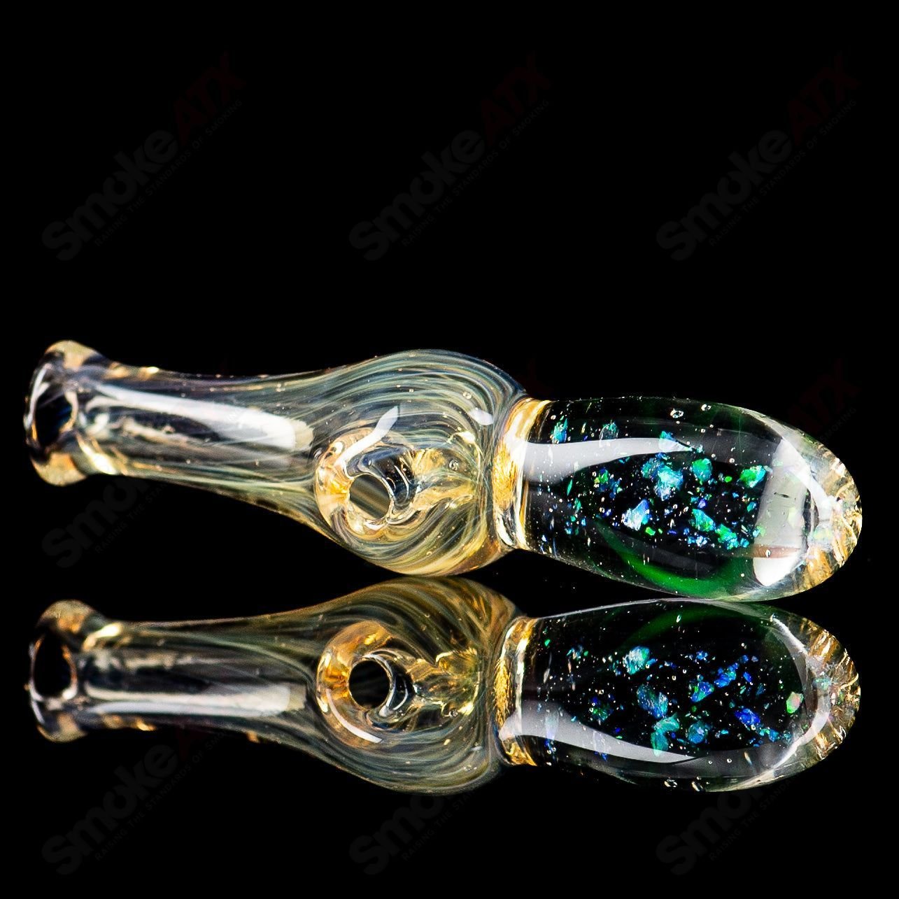 Colorful UV-reactive Puffco Joystick Indo top by Geoff Made Glass, designed for Puffco devices, with intricate glass details.