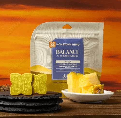 Pineapple flavored Spectrum D9 THC gummies by Hometown Hero, 100mg hemp edibles with pineapple design on the packaging