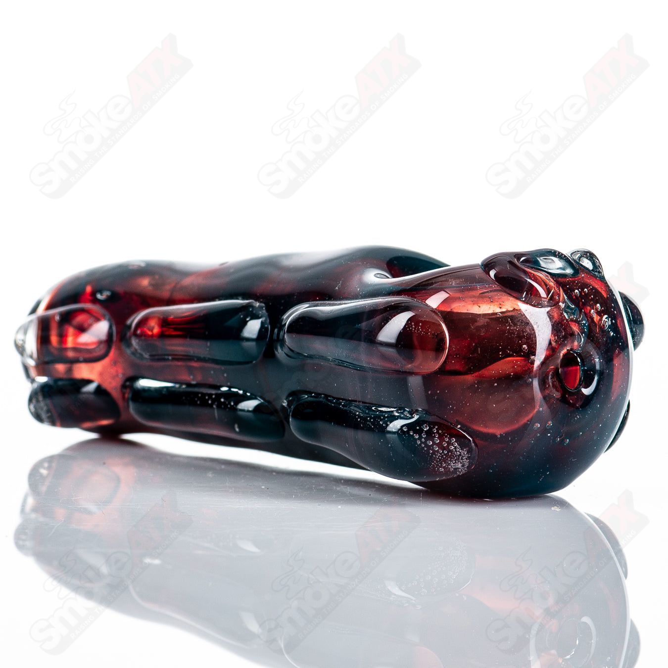 Glass pipe called Spoon Glass by Nobody, featuring a clear glass design with a rounded bowl and smooth handle.